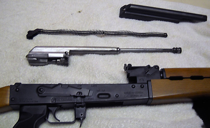 detail, M70 receiver with bolt/bolt carrier, mainspring, and dust cover removed